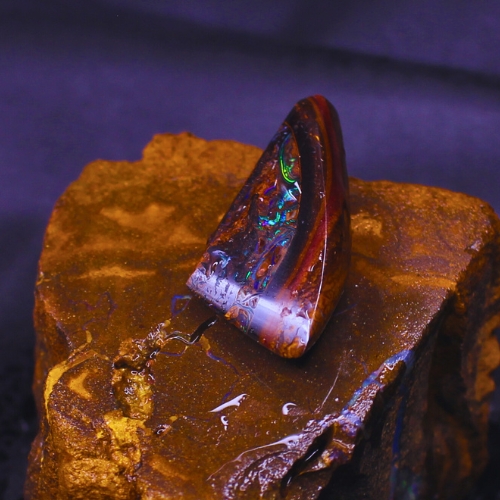 QLDBRPO-038 PIC1 31.00 ct Queensland Natural Boulder Opal with vibrant gold, blue, and green flashes in natural ironstone, authentic Australian gemstone for luxury rings, pendants, and heirloom jewelry.