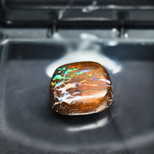QLDBRSPO-283.2 Mystical Queensland Natural Boulder Opal 34.32 ct with mixed play-of-colour, organic patterns, freeform shape, low dome, and vivid multicolour expressions.