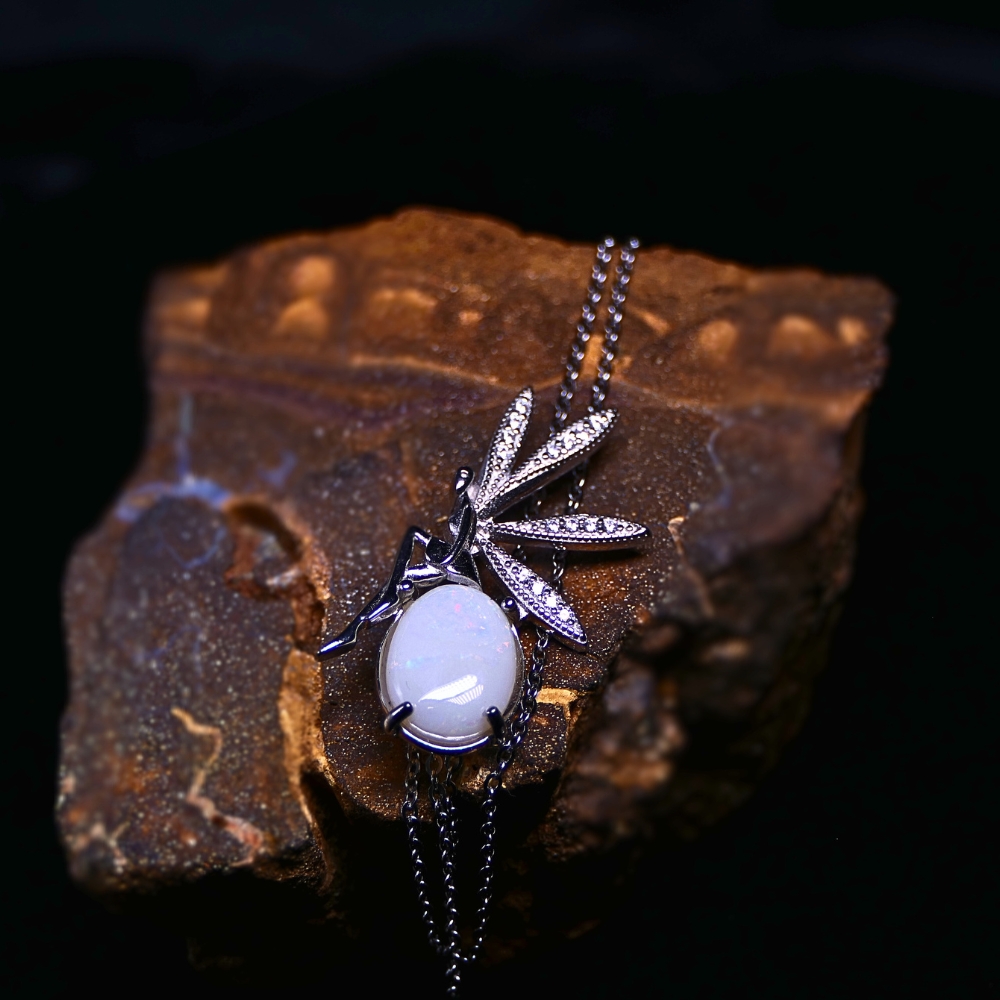 ONWOSPO-606.3 Discover THE FAIRY Coober Pedy White Opal Necklace with magical play-of-colour and 925 silver elegance, creating a wonder-filled expression of light, emotion, and timeless beauty.