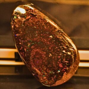Dramatic Natural Queensland Boulder Opal 33.6 Ct with B2 brightness, polished low dome boulder matrix, displaying vibrant blue, green, gold, orange, pink, and purple flashes.