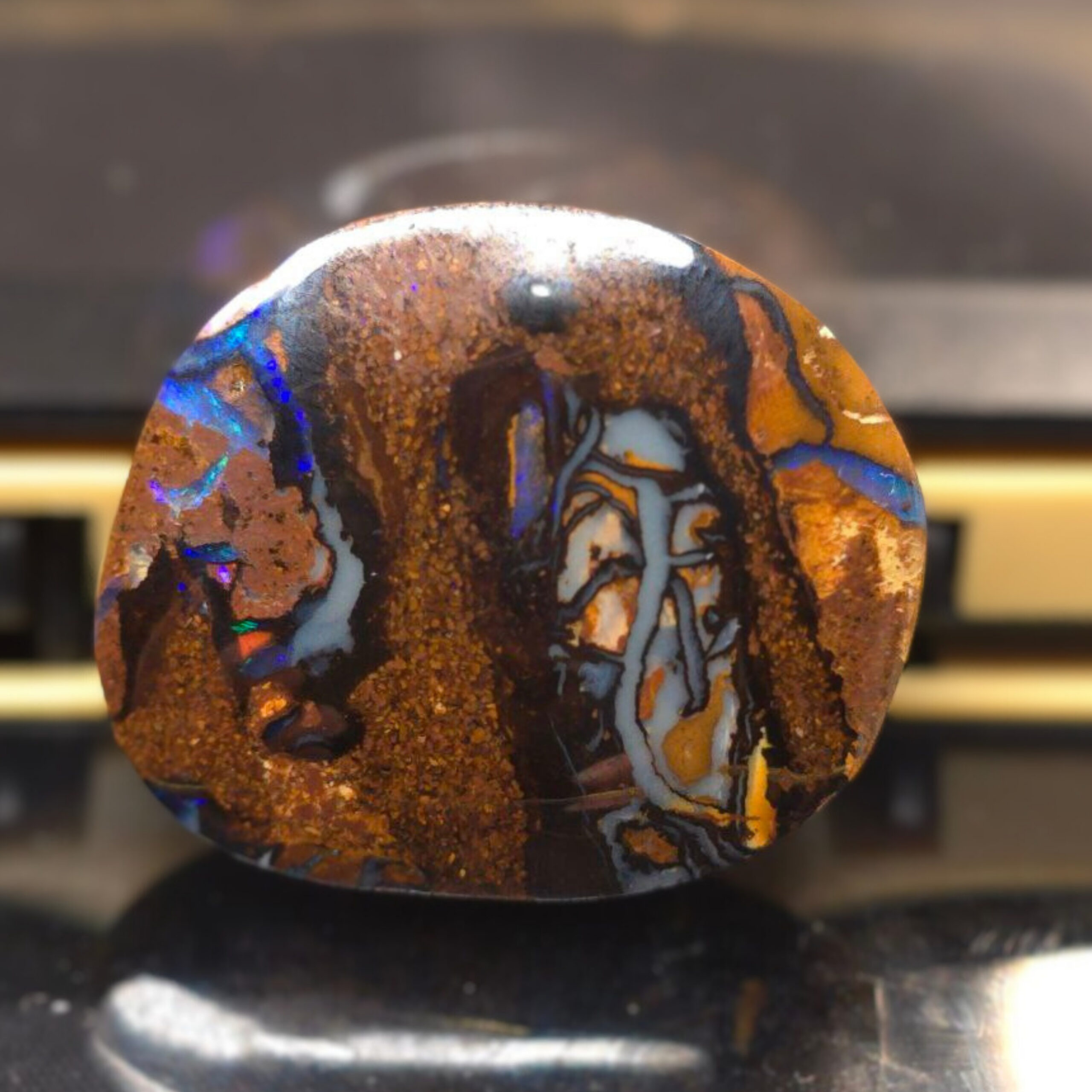 QLDBRSPO-986.3 The Serenade of Dawn Natural Queensland Boulder Opal 18.8 Ct displaying vibrant natural play-of-colour across ironstone, polished to reveal Australia's extraordinary craftsmanship and beauty.