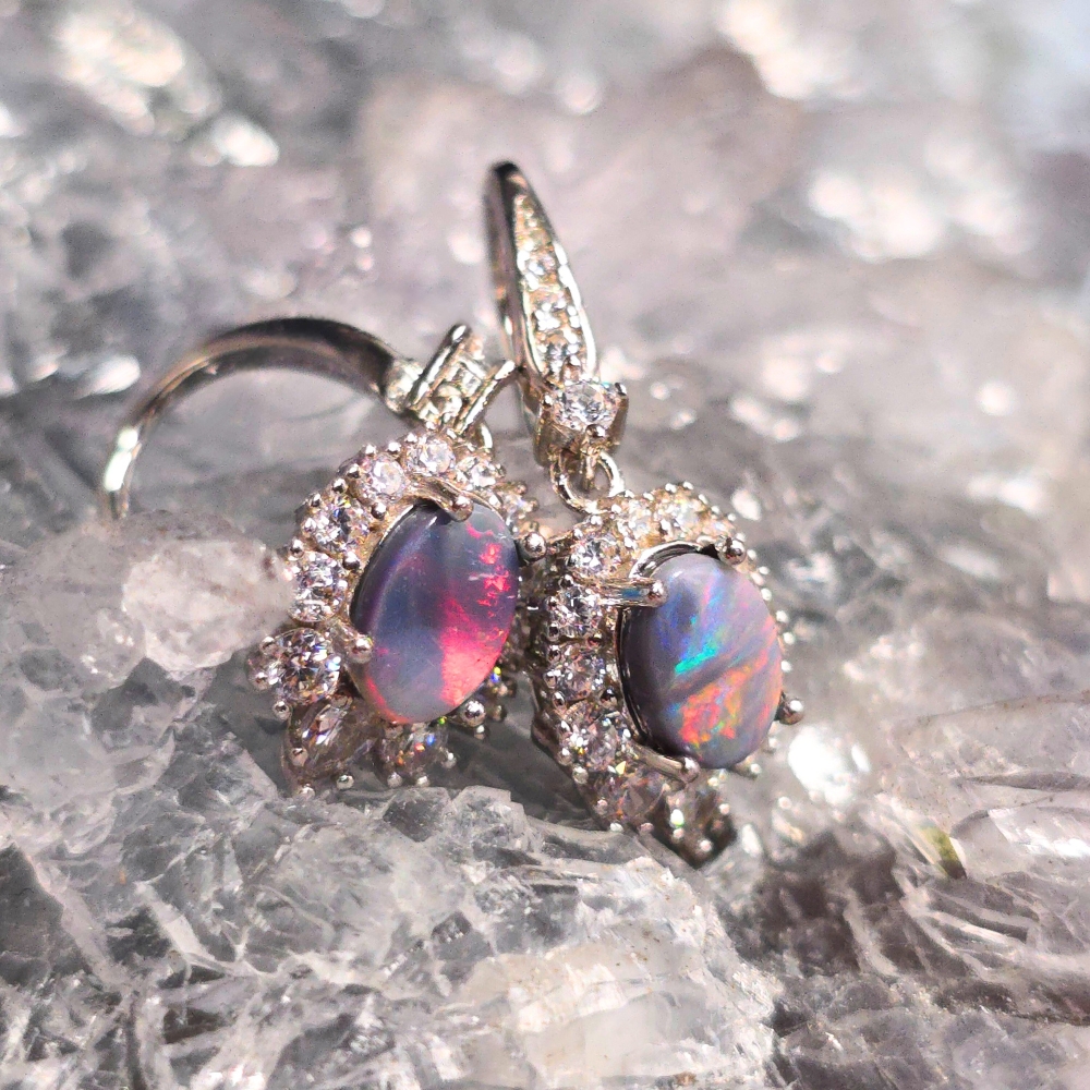 OEDOSPO-1048.5 The “Caribbean Pink Beach” Lightning Ridge Natural Dark Opal Hook Earrings in 925 sterling silver with CZ accents, showing 1.80 Ct opals with green, red, and purple flashes inspired by Caribbean shores.