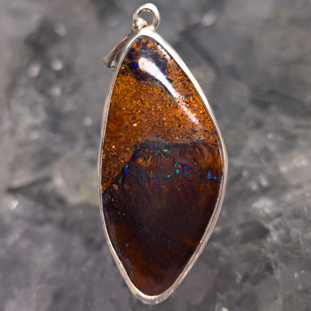 OPBRSPO-1056.3 Discover the Argent Horizon 38.00ct Queensland natural Boulder Opal Pendant in handmade 925 silver. A luminous gemstone jewelry piece