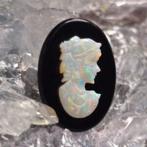 "Chiaroscuro Charm" Coober Pedy White Opal 0.80ct Carving with Obsidian backing