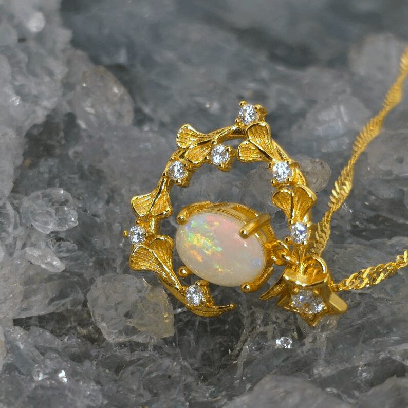 ONWOSPO-1432 (7) Art Nouveau inspired Lightning Ridge natural white opal necklace in 46 cm chain with floral vine, star accent, gold-plated silver setting, glowing multicolour celestial opal pendant.