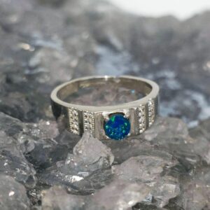 Andre Ring featuring a 0.50ct Lightning Ridge natural Doublet Opal with blue, green, orange, gold and red play-of-colour in an adjustable S925 sterling silver men's ring US size 9½ (AU S+1⁄2)