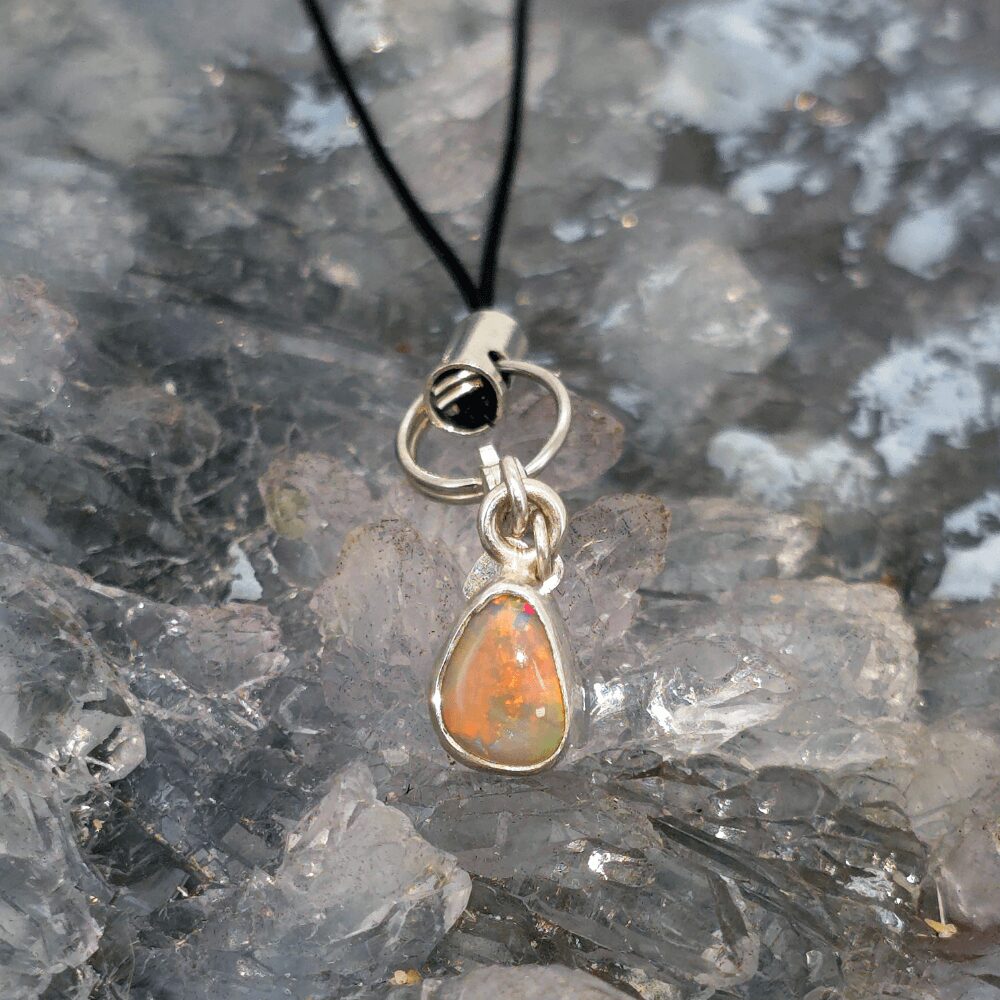 OAWOSPO-1562 (4) Lunara Crest Lightning Ridge natural white opal 0.50ct S925 silver handmade mobile phone charm with soft luminous play of colour.