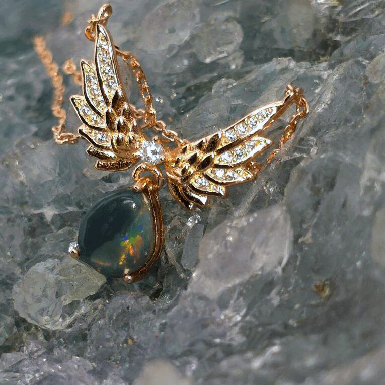 ONBOSPO-1570 (2) Aurel Nacht' Natural Lightning Ridge Black Opal 1.00ct Rose Gold-Plated S925 Silver Necklace with 40 cm and 5 cm extension chain, featuring a teardrop, black opal with colourful flashes and grace.