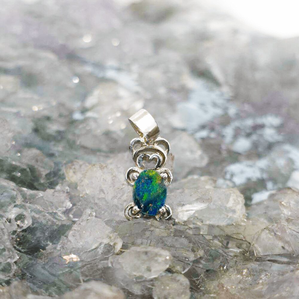 OPDPO-1577 (4) Edenelle Lightning Ridge Natural Doublet Opal 0.11g in S925 Sterling Silver Pendant featuring vibrant Australian play-of-colour and an elegant oval design.