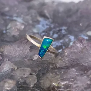Australian Doublet Opal 0.16g Custom S925 Ring US 5¾ (AU L) displays vibrant Lightning Ridge natural opal, B4 brightness, N4 bodytone, unique freeform shape, refined craftsmanship