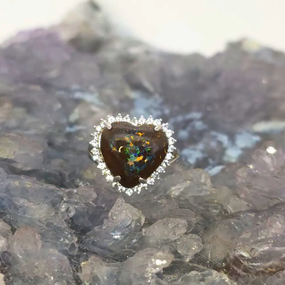 ORBRSPO-1765 (7) Discover the Queensland Boulder Opal 10ct Custom S925 Ring with CZ US 9 ( AU R 1/2 ), showcasing a heart-shaped opal with vibrant natural colour play.