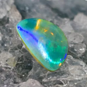 Aurō Mari Lightning Ridge natural Crystal Opal 4.20 ct – solid, freeform, polished, with blue, teal, green, and golden shimmer, authentic Australian opal.