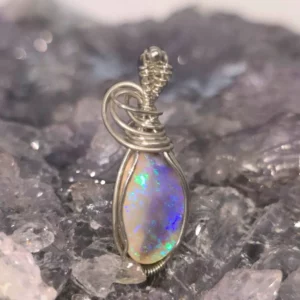 Elarwynne Lightning Ridge Dark Opal 8.00 ct pendant, wire-wrapped S925 sterling silver, showcasing blue and green play-of-colour on a natural picture stone opal.