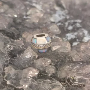 Magiani natural crystal opal charm in sterling silver S925, 0.70 ct, rectangular 9x12 mm, featuring luminous blue, green, orange, gold, and pink play-of-colour, accented with sparkling cubic zirconia, from Coober Pedy, perfect for bracelets or necklaces