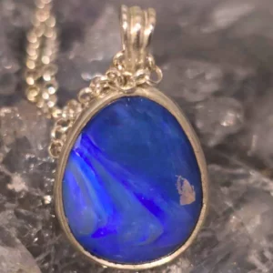Handmade natural crystal opal necklace Aveblu in 925 sterling silver with high-domed, freeform Lightning Ridge opal