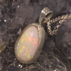 Seren Estoura handmade natural White Opal necklace with pear-cut high-dome cabochon from Lightning Ridge, Australia, set in 925 sterling silver