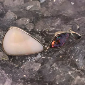 Seviyana Queensland Natural Boulder Opal with Crystal Pipe and Crystal Opal Rhodium-Plated 925 Silver Handmade Pendant showcasing kaleidoscopic blue, green, pink, orange, gold, and red hues in a polished low-dome finish, luxury artisan statement jewelry.