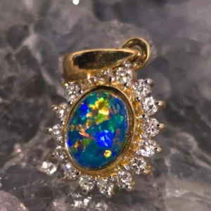 'Aranja Nyra' Lightning Ridge Natural Doublet Opal 0.2g Handcrafted Pendant in 14KYG with Natural Diamond Accents