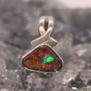 Handcrafted multicolour solid, natural Boulder Opal ring rhodium plated 925 silver flowing band design